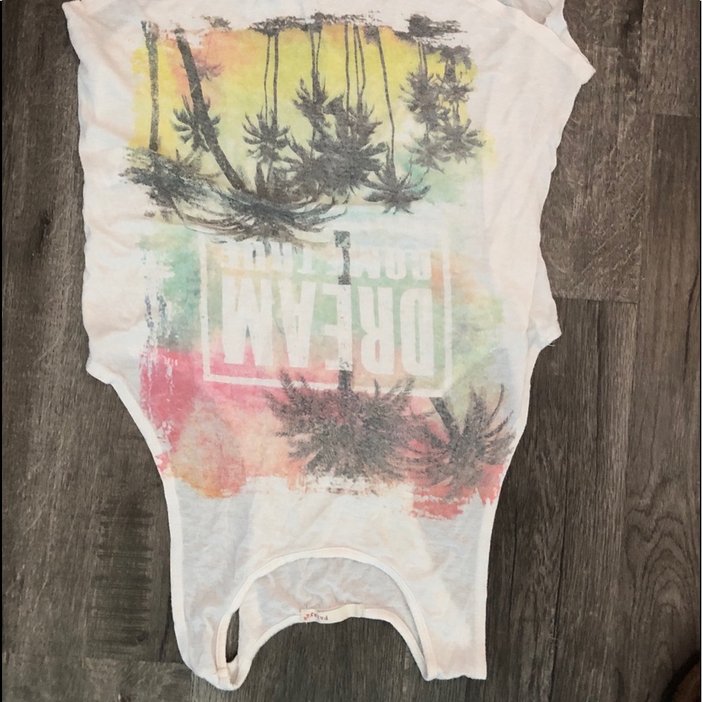 Adorable white tank top with sunset.